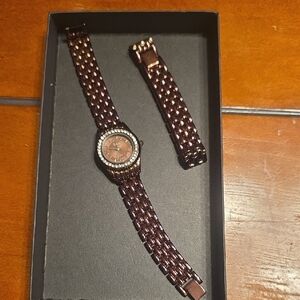 Elegant Brown Watch with Interchangeable Strap